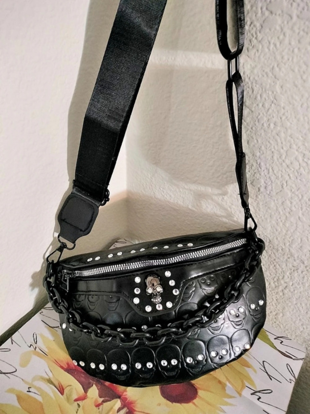 Skull embossed Studded Black Crossbody Bag with matchind accessories.